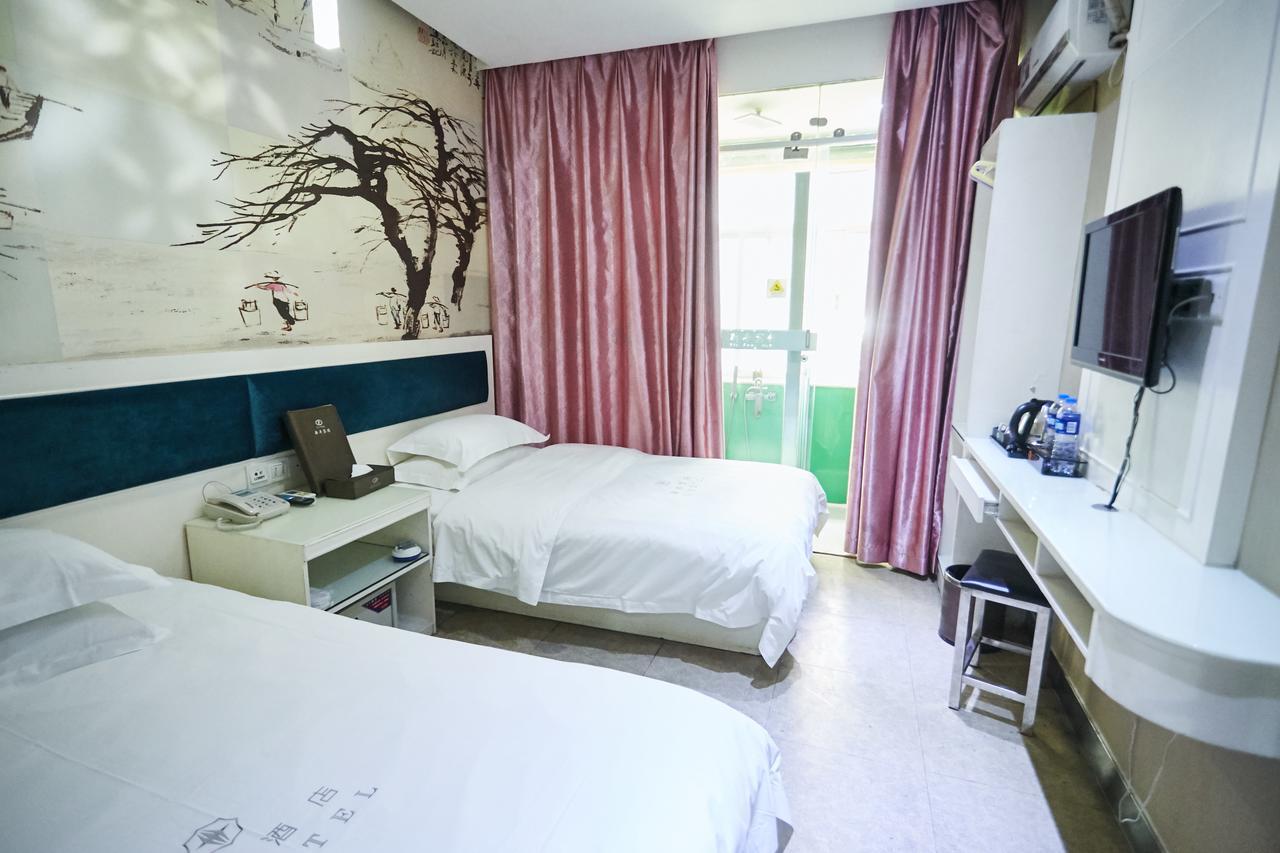Xinghe Xinfeng Hotel Kanton Exterior foto